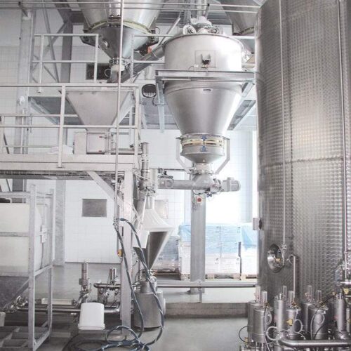 Daxner Silo-Dosieranlage für Pulverkomponenten zur Herstellung von Milchprodukten Silo- and dosing facility for powder components in the production of dairy products