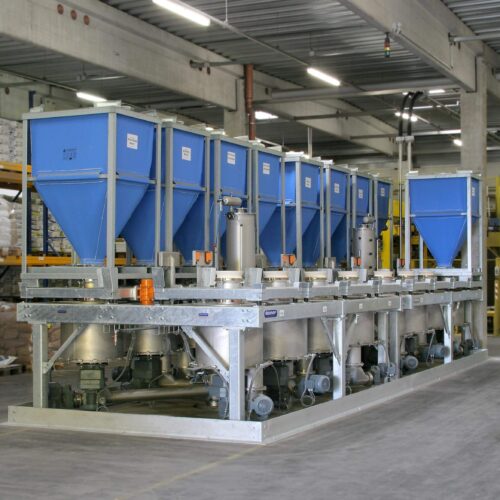 Daxner Kleinkomponenten-Container-Dosieranlage Produktaufgabe mit Containersystem Zwischenbehaelter mit Ruehrwerk-Austragapparat Dosierschnecke mit Flow-Stop